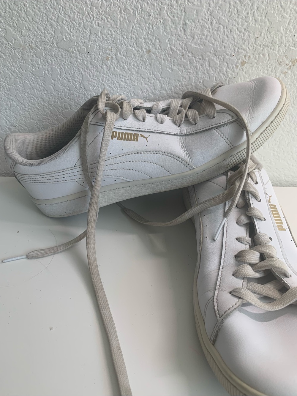 Puma Women's White Leather Sneakers with Gold Branding
